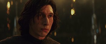Movie still from “Star Wars: Episode VIII - The Last Jedi” (2017), directed by Rian Johnson – A person with long dark hair; Close Up shot, Low angle