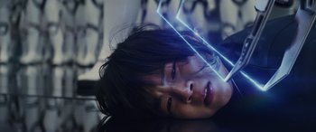 Movie still from “Star Wars: Episode VIII - The Last Jedi” (2017), directed by Rian Johnson – A young girl with long hair is laying on the ground; Close Up shot, Overhead angle
