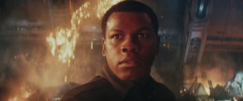 Movie still from “Star Wars: Episode VIII - The Last Jedi” (2017), directed by Rian Johnson – A person wearing a military uniform; Close Up shot, Low angle