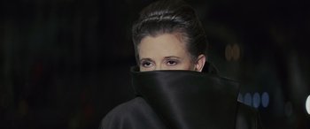 Movie still from “Star Wars: Episode VIII - The Last Jedi” (2017), directed by Rian Johnson – A person covering her face; Close Up shot, Over the shoulder angle