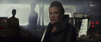 Movie still from “Star Wars: Episode VIII - The Last Jedi” (2017), directed by Rian Johnson – A person wearing a jacket; Close Up shot, Over the shoulder angle