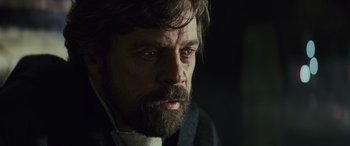 Movie still from “Star Wars: Episode VIII - The Last Jedi” (2017), directed by Rian Johnson – A person with a beard; Close Up shot, Over the shoulder angle