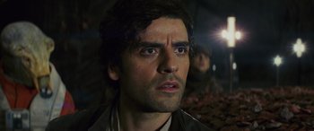 Movie still from “Star Wars: Episode VIII - The Last Jedi” (2017), directed by Rian Johnson – A person looking at the camera; Close Up shot, Low angle