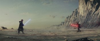 Movie still from “Star Wars: Episode VIII - The Last Jedi” (2017), directed by Rian Johnson – An image of an ocean with a mountain in the background; Extreme Wide shot, Low angle