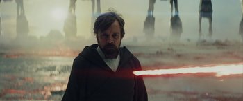 Movie still from “Star Wars: Episode VIII - The Last Jedi” (2017), directed by Rian Johnson – A person with a lightsaber in a room; Medium shot, Over the shoulder angle