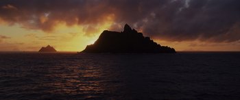 Movie still from “Star Wars: Episode VIII - The Last Jedi” (2017), directed by Rian Johnson – The sun is setting over a small island; Extreme Wide shot, Low angle