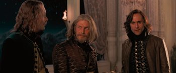 Movie still from “Stardust” (2007), directed by Matthew Vaughn – A man with long white hair and a beard; Medium shot, Over the shoulder angle
