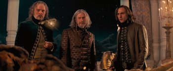 Movie still from “Stardust” (2007), directed by Matthew Vaughn – A man with long white hair standing next to another man with long black hair; Medium shot, Low angle
