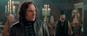 Movie still from “Stardust” (2007), directed by Matthew Vaughn – A person wearing a leather jacket; Close Up shot, Over the shoulder angle