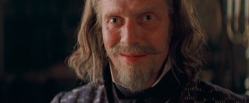 Movie still from “Stardust” (2007), directed by Matthew Vaughn – A person with long hair and a beard; Close Up shot, Low angle