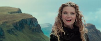 Movie still from “Stardust” (2007), directed by Matthew Vaughn – A person with long blonde curly hair; Close Up shot, Low angle