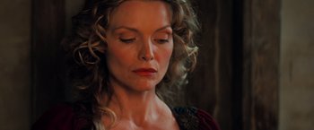 Movie still from “Stardust” (2007), directed by Matthew Vaughn – A person with curly hair; Close Up shot, High angle