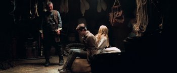 Movie still from “Stardust” (2007), directed by Matthew Vaughn – A man and a woman sitting on a bean bag chair; Wide shot, Over the shoulder angle