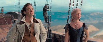 Movie still from “Stardust” (2007), directed by Matthew Vaughn – A man and a woman standing next to each other; Medium shot, Low angle