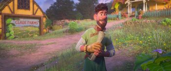 Movie still from “Strange World” (2022), directed by Don Hall – An animated character holding a newspaper in a grassy area; Medium shot, Over the shoulder angle