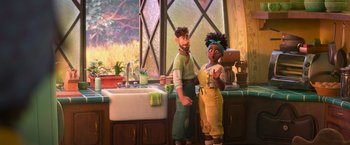 Movie still from “Strange World” (2022), directed by Don Hall – A couple of people standing in front of a kitchen sink; Wide shot, Over the shoulder angle