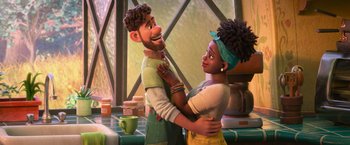 Movie still from “Strange World” (2022), directed by Don Hall – A man and a woman standing next to each other in a kitchen; Medium shot, Over the shoulder angle