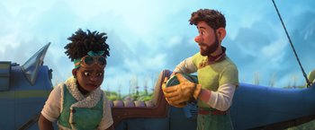 Movie still from “Strange World” (2022), directed by Don Hall – A man and a woman holding a ball in front of a sky background; Medium shot, Over the shoulder angle