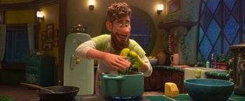 Movie still from “Strange World” (2022), directed by Don Hall – A man in an apron is making food in a pot; Medium shot, High angle
