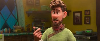 Movie still from “Strange World” (2022), directed by Don Hall – An animated man holding a rock in his hand; Close Up shot, Over the shoulder angle