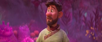 Movie still from “Strange World” (2022), directed by Don Hall – An animated man with a beard is looking up; Medium shot, Over the shoulder angle