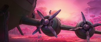 Movie still from “Strange World” (2022), directed by Don Hall – An image of an airplane that is flying in the sky; Extreme Wide shot, High angle