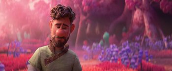 Movie still from “Strange World” (2022), directed by Don Hall – An animated character is crying in a field; Close Up shot, Over the shoulder angle