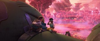 Movie still from “Strange World” (2022), directed by Don Hall – A woman sitting on top of an airplane next to another woman; Wide shot, Over the shoulder angle