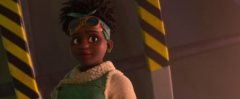 Movie still from “Strange World” (2022), directed by Don Hall – A doll's face in a room with yellow and white striped walls; Close Up shot, Over the shoulder angle