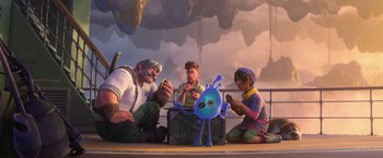 Movie still from “Strange World” (2022), directed by Don Hall – A group of people sitting on the ground next to a blue object; Wide shot, High angle