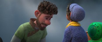 Movie still from “Strange World” (2022), directed by Don Hall – A man with a beard talking to a child; Close Up shot, Over the shoulder angle