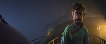 Movie still from “Strange World” (2022), directed by Don Hall – A man standing in front of a railing at night; Medium shot, High angle