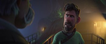 Movie still from “Strange World” (2022), directed by Don Hall – An animated man with a beard and a green sweater; Close Up shot, Over the shoulder angle