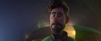 Movie still from “Strange World” (2022), directed by Don Hall – An animated man with a beard and a hat; Close Up shot, Over the shoulder angle
