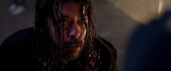 Movie still from “Studio 666” (2022), directed by BJ McDonnell – A person with long hair; Close Up shot, Low angle