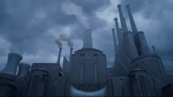 Movie still from “Charlie and the Chocolate Factory” (2005), directed by Tim Burton – A large building with smoke coming out of the top of it; Extreme Wide shot, Low angle
