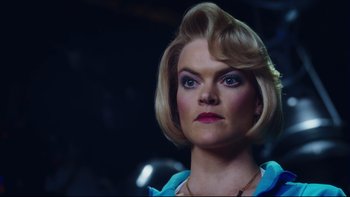 Movie still from “Charlie and the Chocolate Factory” (2005), directed by Tim Burton – A person with short blonde hair; Close Up shot, Low angle