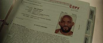 Movie still from “Suicide Squad” (2016), directed by David Ayer – An image of a man with a black beard; Extreme Close Up shot, Overhead angle