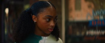 Movie still from “Summering” (2022), directed by James Ponsoldt – A person wearing a white shirt; Close Up shot, Over the shoulder angle