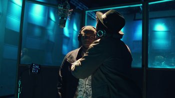 Movie still from “Summertime” (2020), directed by Carlos López Estrada – Two men in a recording studio with headphones on; Close Up shot, Low angle