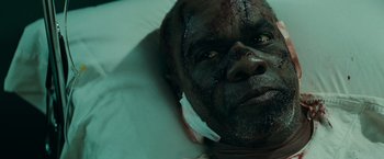 Movie still from “Super 8” (2011), directed by J.J. Abrams – A person in a hospital bed; Close Up shot, High angle