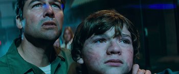 Movie still from “Super 8” (2011), directed by J.J. Abrams – A person looking up at the sky; Close Up shot, Low angle