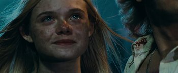 Movie still from “Super 8” (2011), directed by J.J. Abrams – A girl's eyes and hair; Close Up shot, Low angle