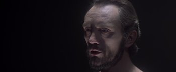 Movie still from “Superman” (1978), directed by Richard Donner – A person with a beard; Close Up shot, Low angle