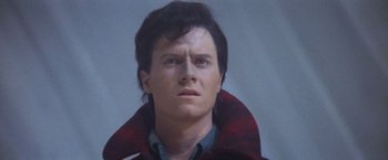 Movie still from “Superman” (1978), directed by Richard Donner – A person wearing a jacket; Close Up shot, Low angle