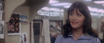 Movie still from “Superman” (1978), directed by Richard Donner – A person wearing a shirt; Close Up shot, Over the shoulder angle