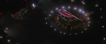 Movie still from “Superman” (1978), directed by Richard Donner – A helicopter is flying through the air at night; Extreme Wide shot, Overhead angle