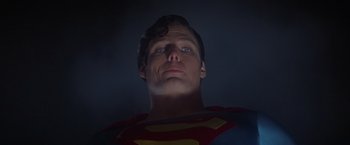 Movie still from “Superman” (1978), directed by Richard Donner – A person wearing a superman costume; Close Up shot, Low angle