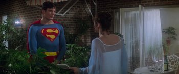 Movie still from “Superman” (1978), directed by Richard Donner – A man and a woman dressed as superman; Medium shot, Over the shoulder angle
