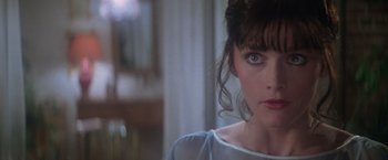 Movie still from “Superman” (1978), directed by Richard Donner – A woman's face in a room; Close Up shot, Over the shoulder angle